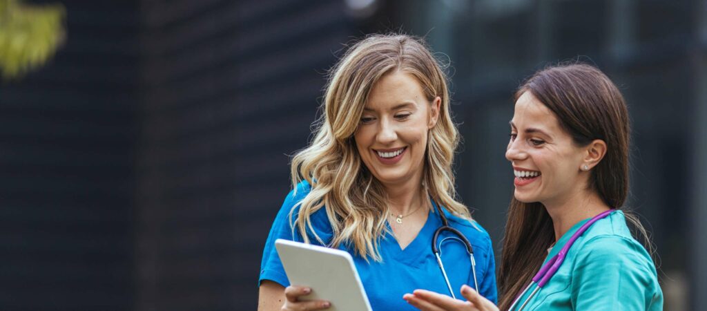 Two nurses talking to each other